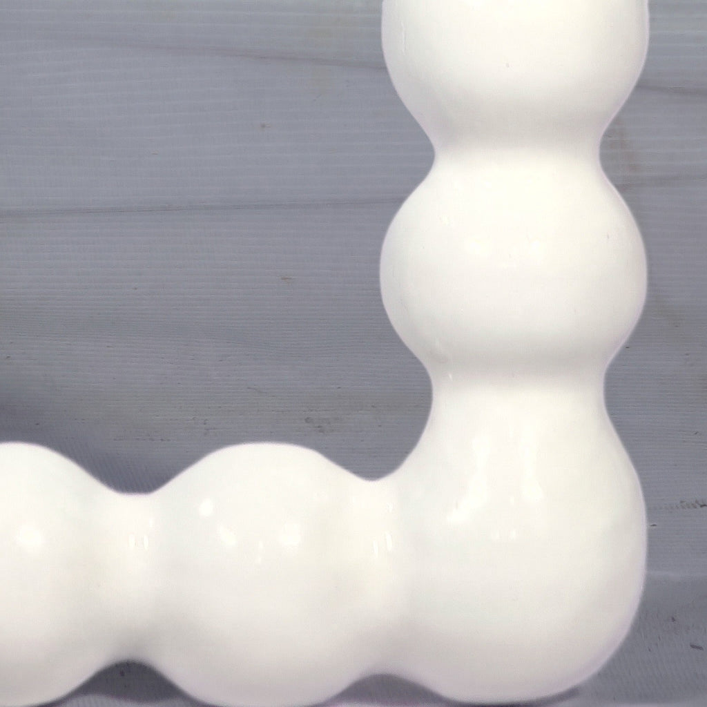 Espejo Perla Blanco — detalle del material