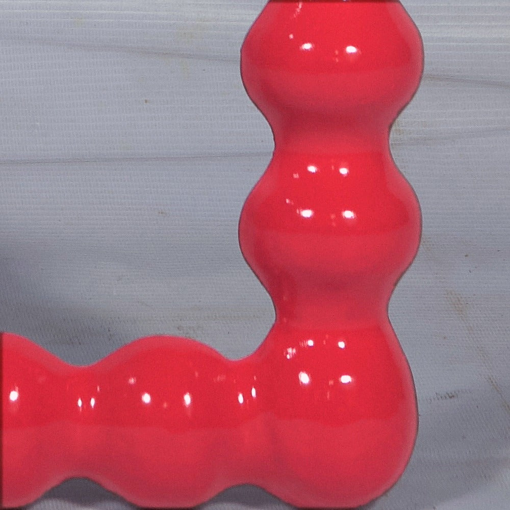 Espejo Perla Rojo — detalle del material
