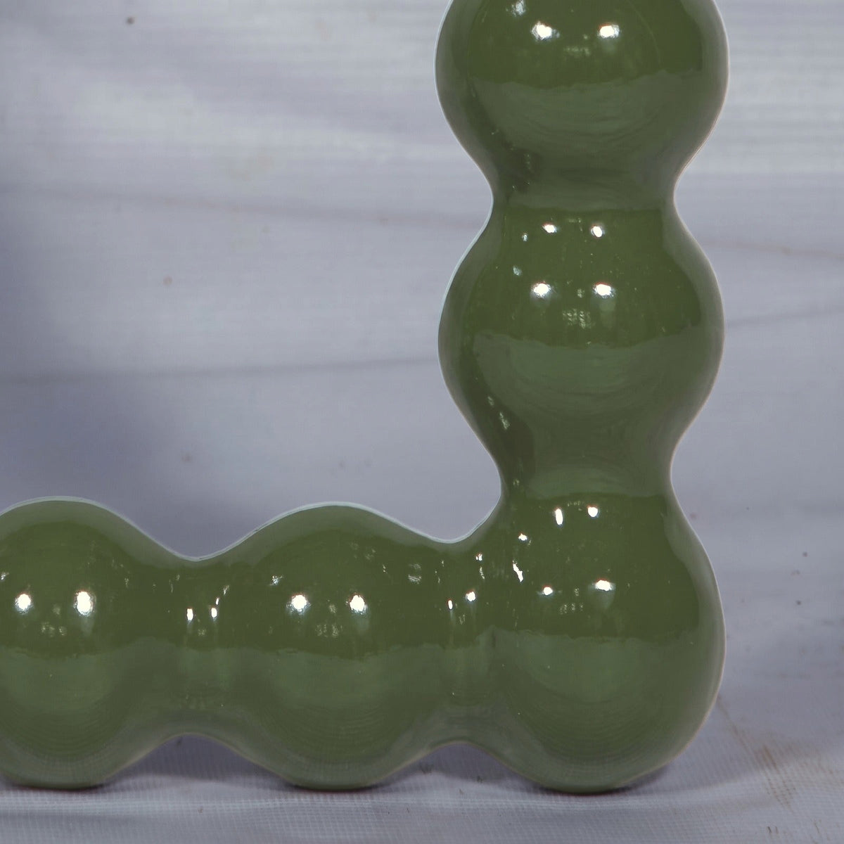 Espejo Perla Verde — detalle del material